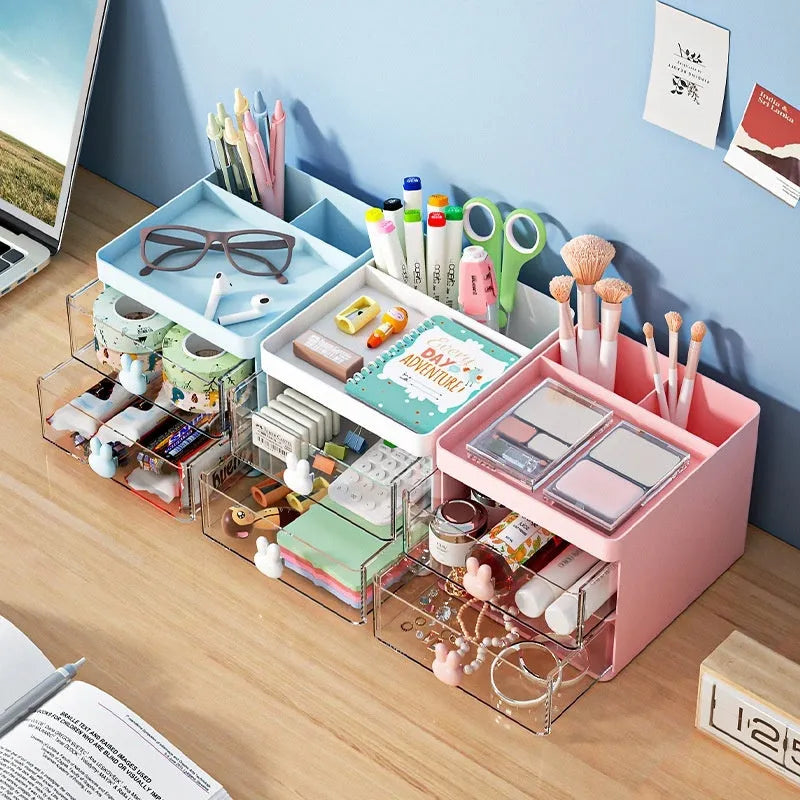 Transparent drawer style partitioned desktop storage box for cosmetics and stationery organisation with 2L capacity in PP plastic available in white, glacier blue or cherry blossom pink with modern simplicity design