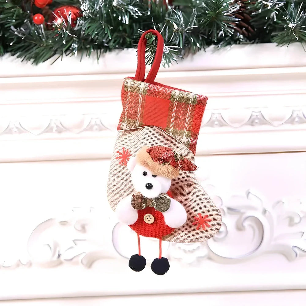 Christmas stocking gift bag measuring 10x20cm with festive character designs