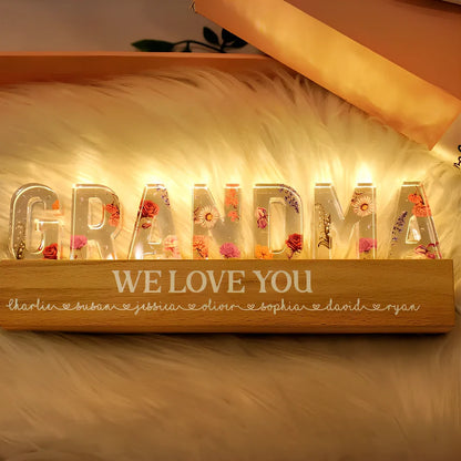 Custom flower printed LED night light with personalised text on acrylic surface in three size options