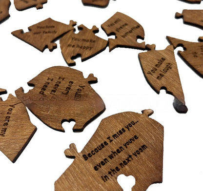 Wooden heart puzzle with love messages for romantic gifts, light brown color.
