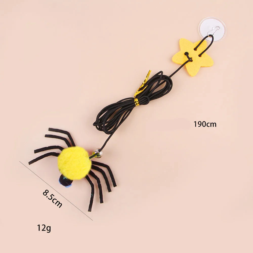 Cat toy hanging from door with elastic rope, colourful feather, bell and soft spider decoration