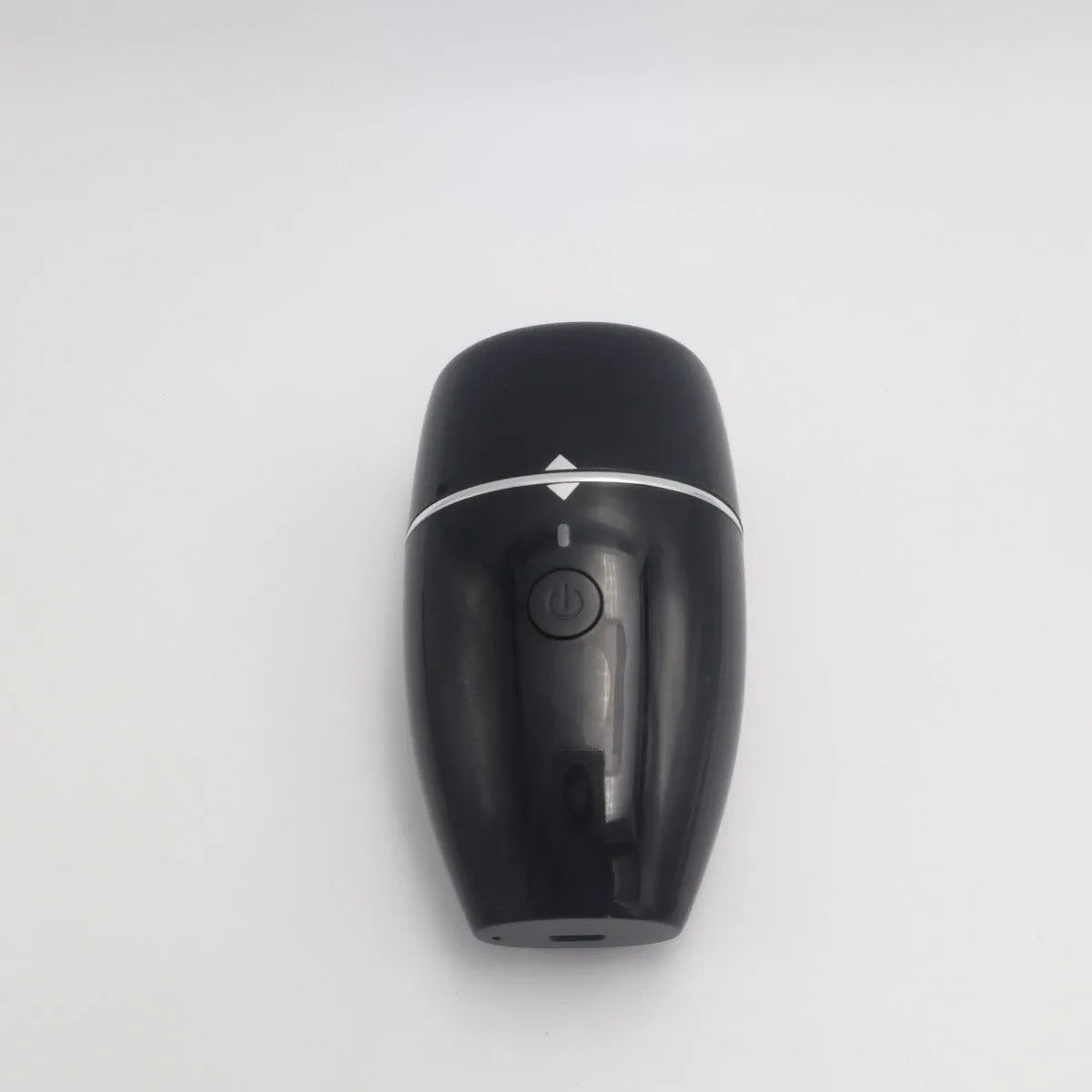 Black and white electric lip plumper device with silicone tip and USB cable