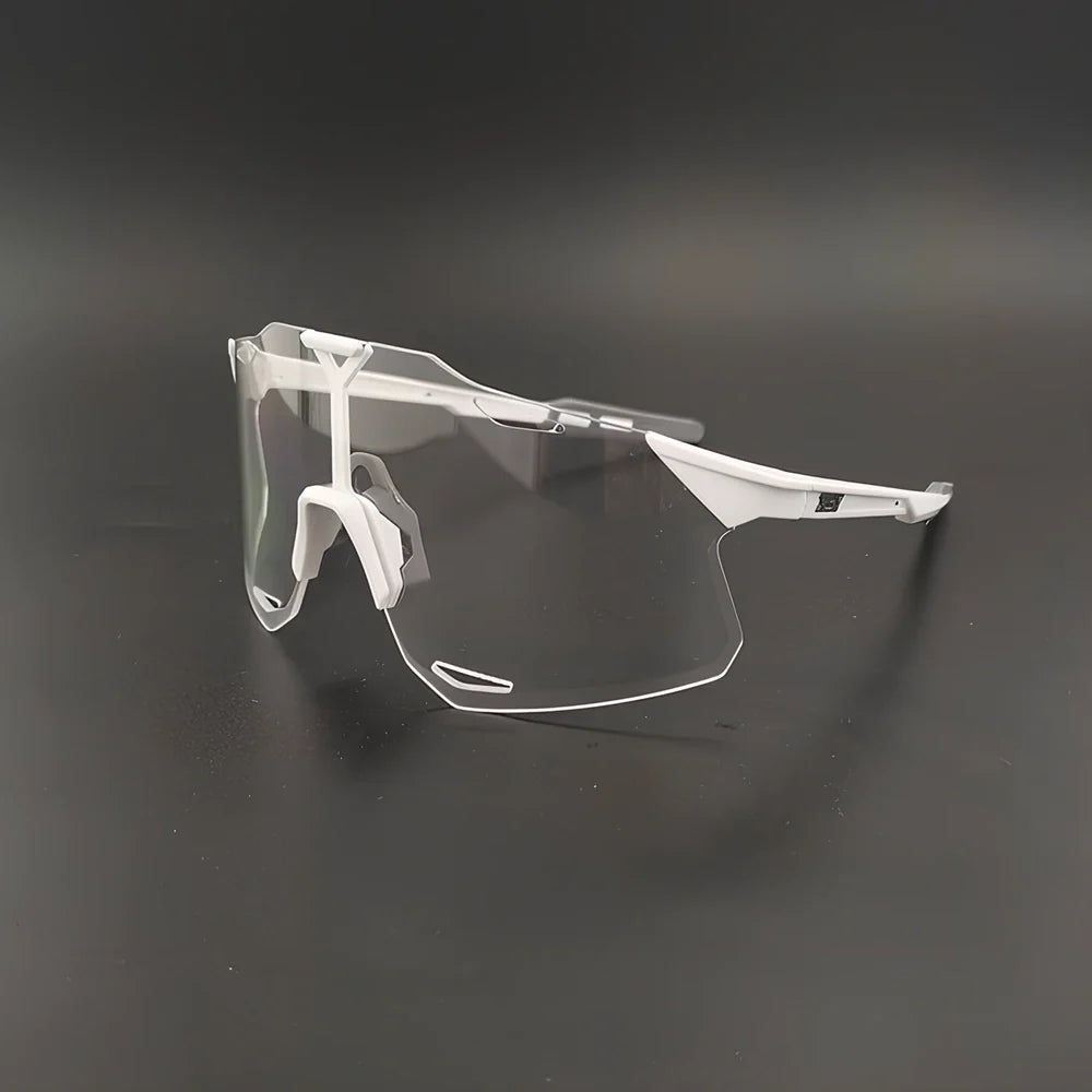 Cycling glasses with interchangeable lenses showing UV400 protection and lightweight frame design