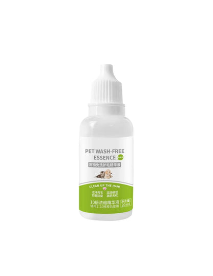 Dog grooming spray bottle and massaging comb kit on a white background.