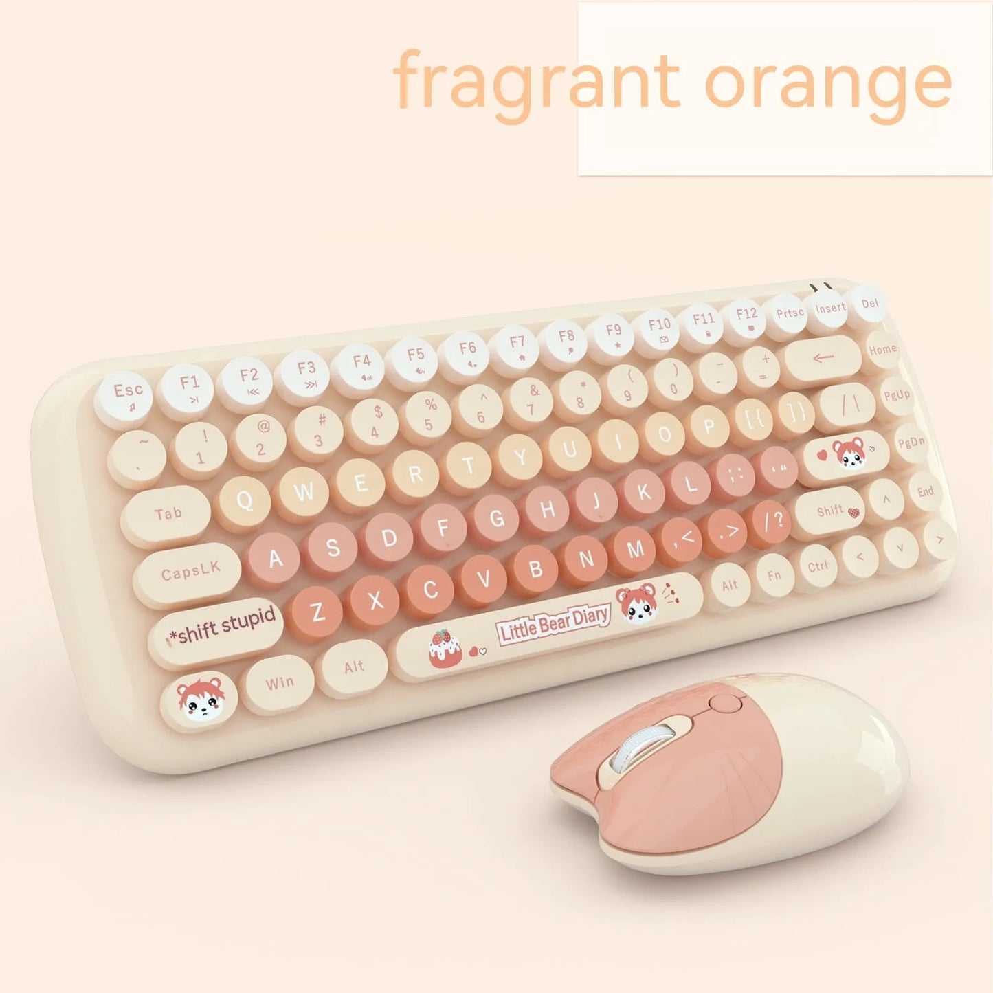 Pink mini wireless keyboard and mouse set with cute cartoon design on desk