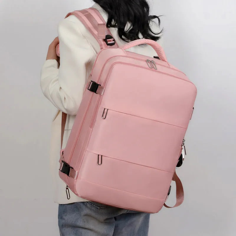 Large purple Oxford cloth travel backpack with multiple compartments and an air pillow belt.