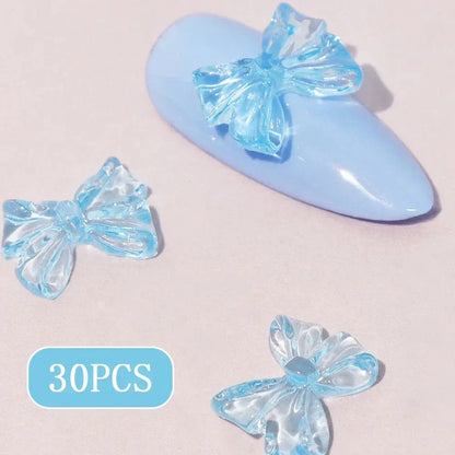Candy pink bow-shaped 3D resin nail charms for adding a cute and playful touch to your manicure