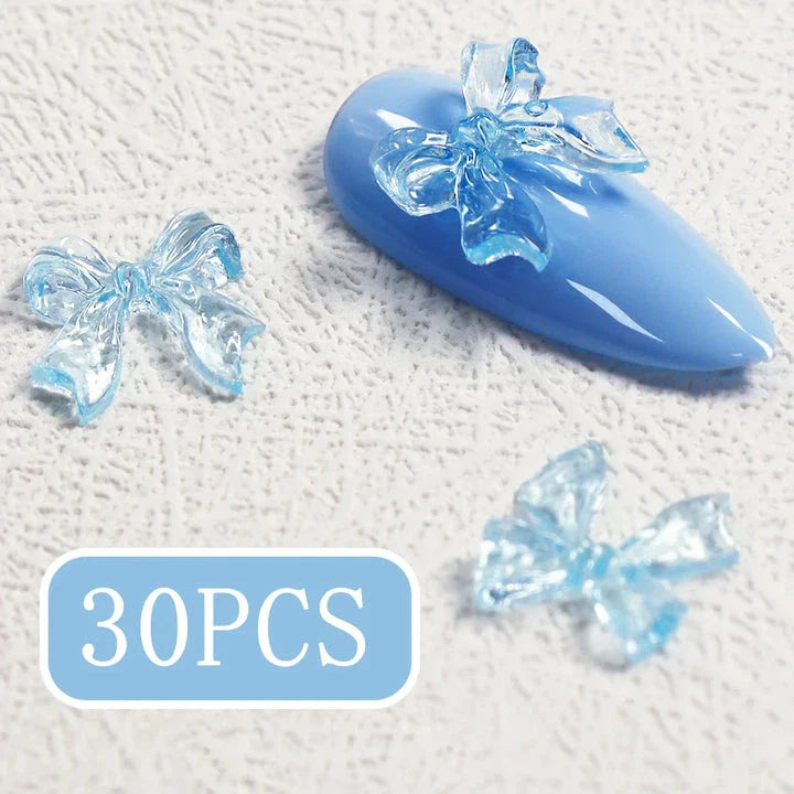 Candy pink bow-shaped 3D resin nail charms for adding a cute and playful touch to your manicure
