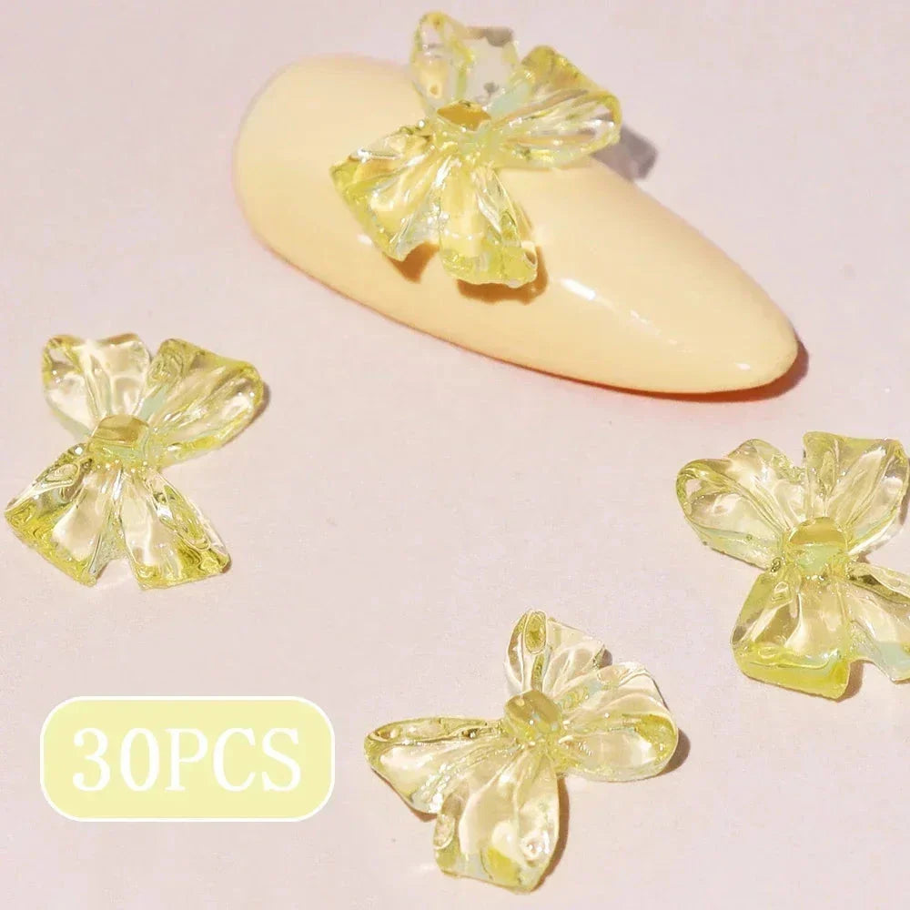 Candy pink bow-shaped 3D resin nail charms for adding a cute and playful touch to your manicure