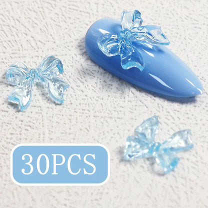 Candy pink bow-shaped 3D resin nail charms for adding a cute and playful touch to your manicure