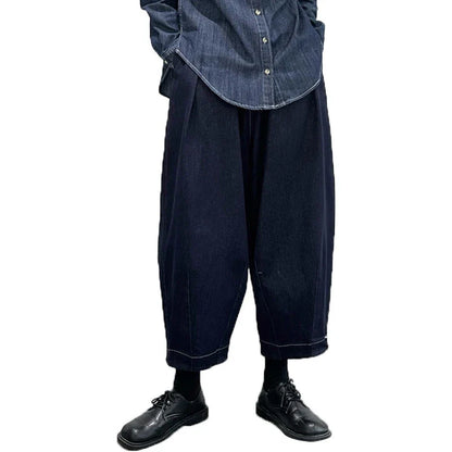 Women's cropped jeans in a denim blue color with a loose, relaxed fit for all-day comfort and style