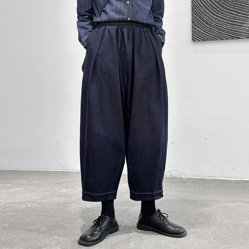 Women's cropped jeans in a denim blue color with a loose, relaxed fit for all-day comfort and style