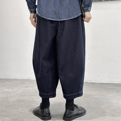 Women's cropped jeans in a denim blue color with a loose, relaxed fit for all-day comfort and style