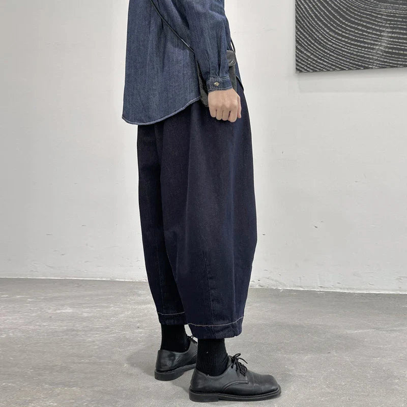 Women's cropped jeans in a denim blue color with a loose, relaxed fit for all-day comfort and style