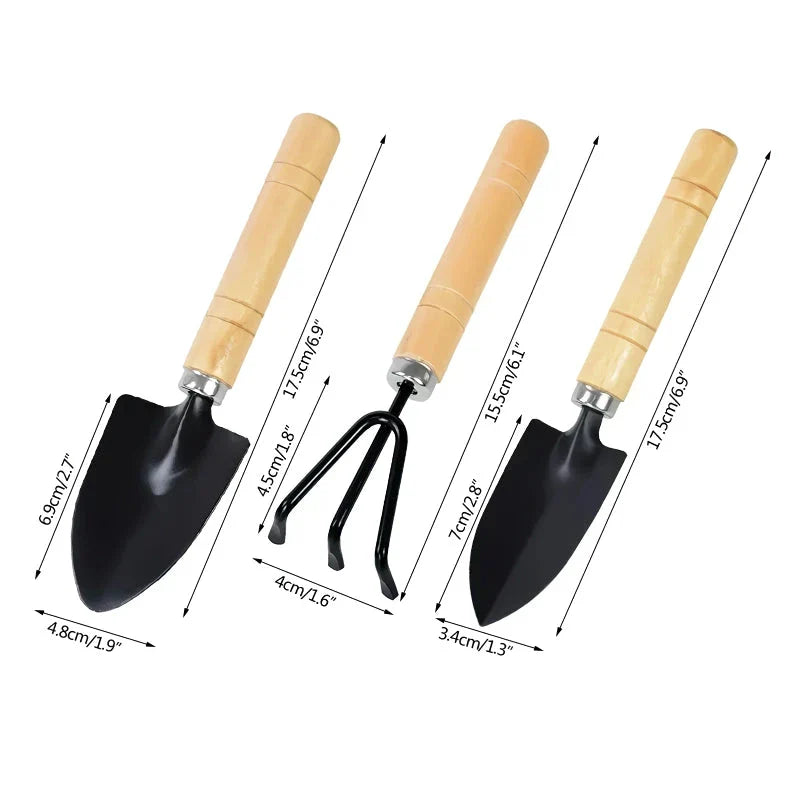 A set of 3 mini garden tools including a shovel, trowel, and rake made of premium solid wood and rust-proof iron for durable and efficient gardening