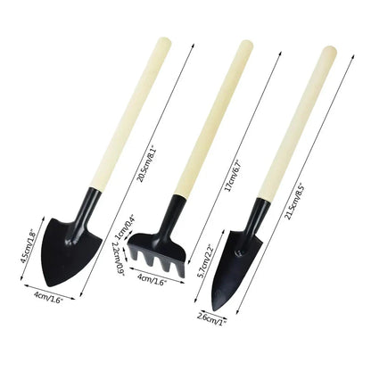 A set of 3 mini garden tools including a shovel, trowel, and rake made of premium solid wood and rust-proof iron for durable and efficient gardening