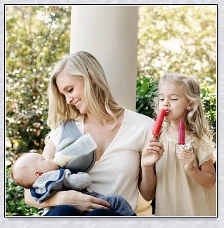 A yellow hands-free baby bottle holder that allows parents to multitask during feeding time