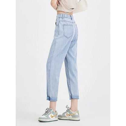 Light blue casual high waist harem jeans with a flattering fit and trendy style