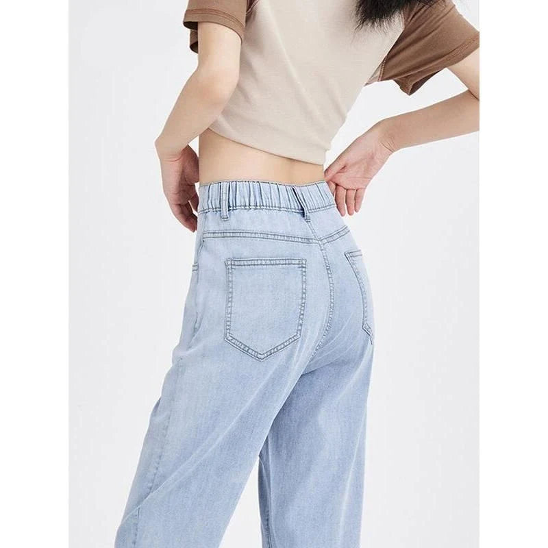 Light blue casual high waist harem jeans with a flattering fit and trendy style