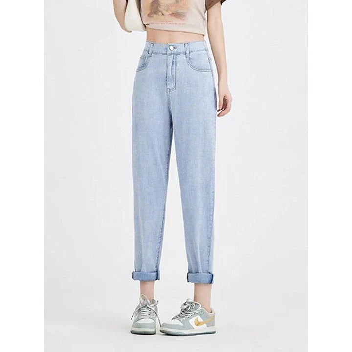 Light blue casual high waist harem jeans with a flattering fit and trendy style