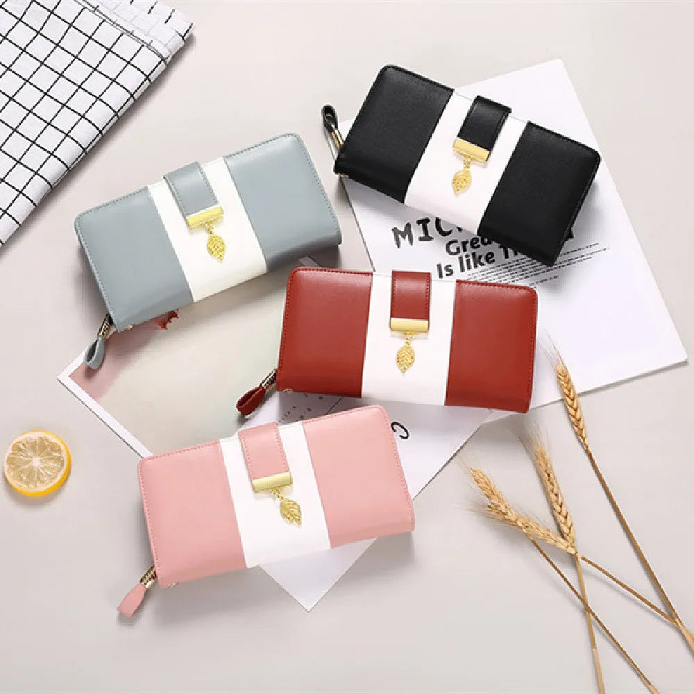 Anti-theft PU leather handbag with lock closure showing 19.5cm compact design