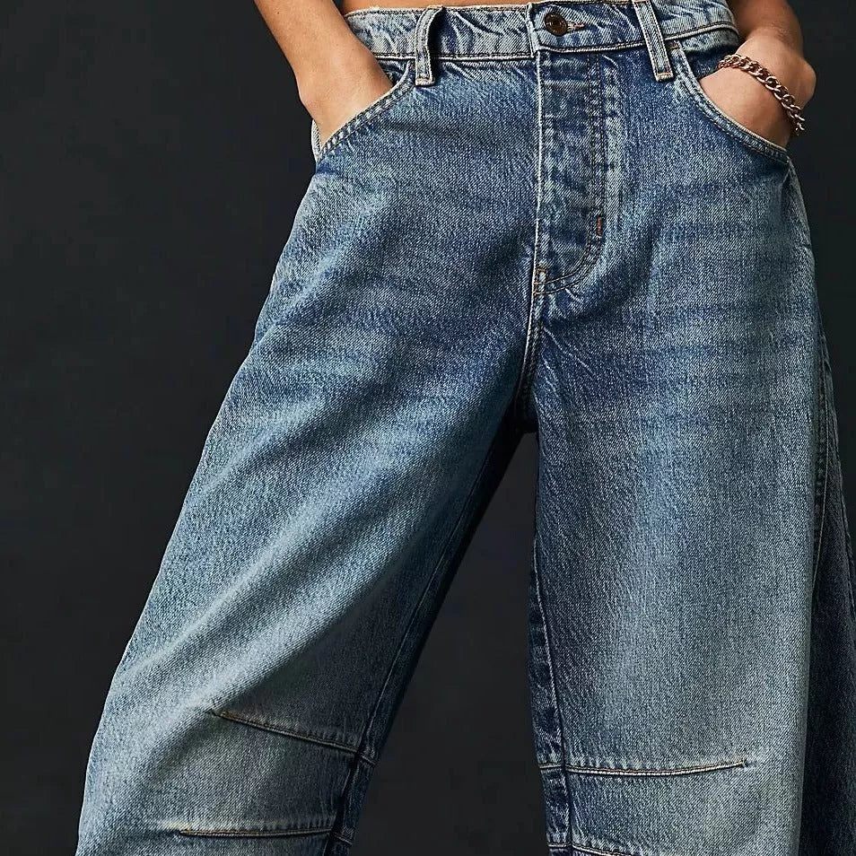 Women's mid-rise barrel jeans with wide leg design in various colors