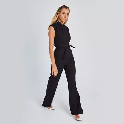 Women's sleeveless V-neck jumpsuit in black, white, or khaki with wide leg design