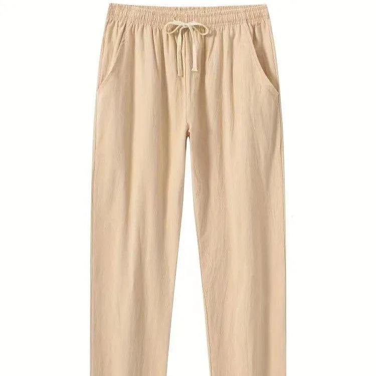 Men's cotton linen beach trousers in loose casual fit, shown in solid colour options