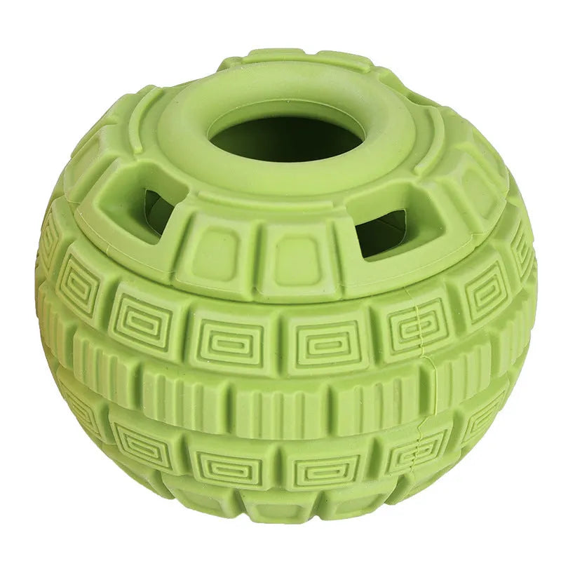 Green natural rubber ball pet toy for dogs and cats on a white background