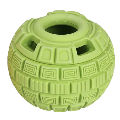 Green natural rubber ball pet toy for dogs and cats on a white background