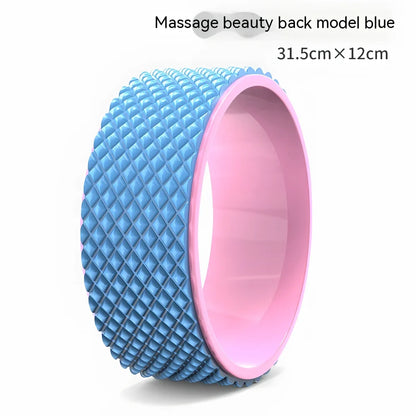 Pink yoga wheel with 31.5cm diameter and 12.2cm width for back-bending exercises