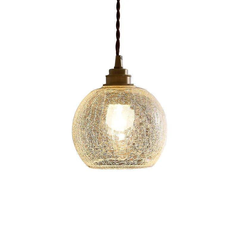 Compact spherical brass and glass ball chandelier with copper finish and clear glass shade, shown in diamond colour.