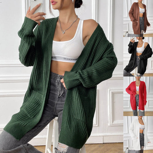 Women's dark green cardigan with two front pockets, 65cm length, loose fit design with long sleeves