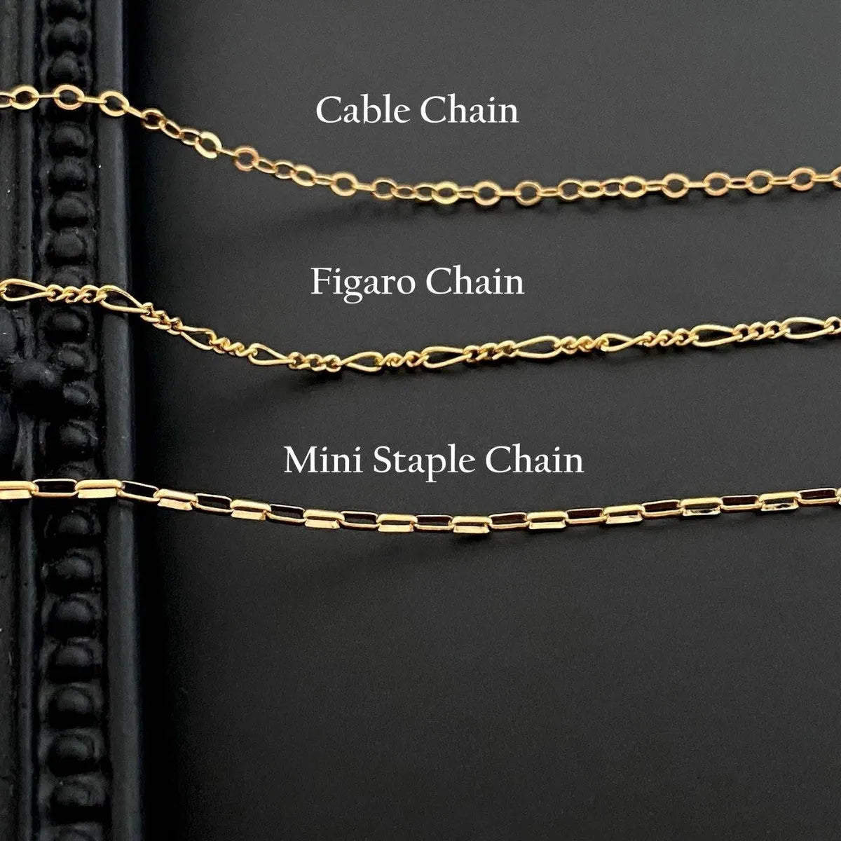 Titanium steel ghost pendant necklace on a 45cm stainless steel chain with electroplated finish, available in cable, figaro, or mini staple styles.