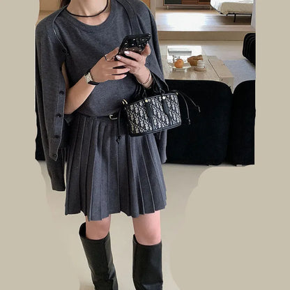 Women's grey art retro vest skirt and long-sleeved cardigan set with 3D pattern and adjustable belt.