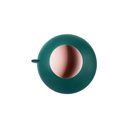 Green Gold reusable gel lint roller ball for removing pet hair from fabrics.