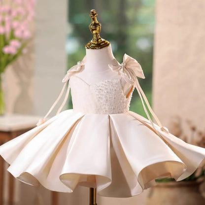 Girls' champagne polyester piano dress with pettiskirt in princess style showing height sizing options
