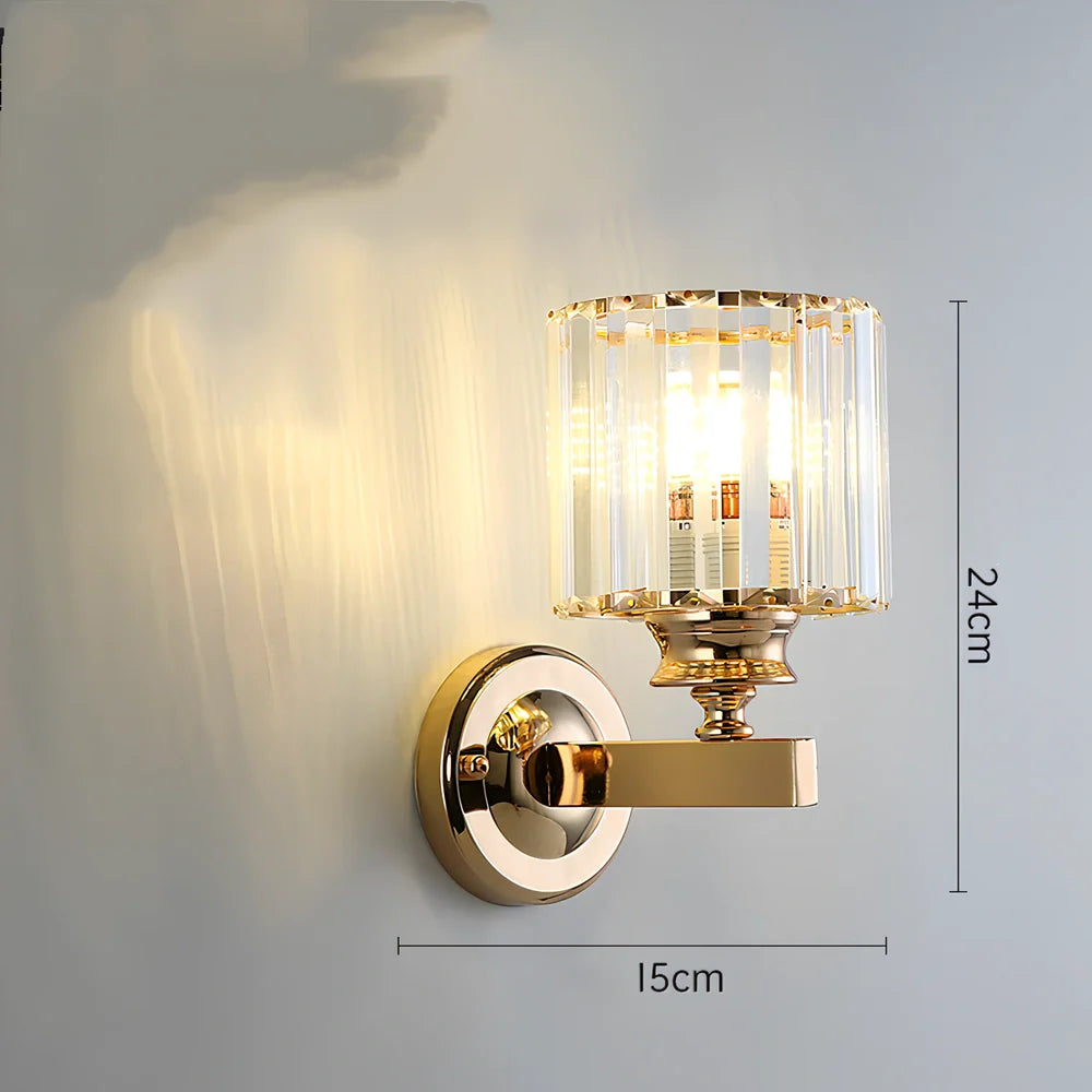 Crystal bedside lamp with stainless steel base and transparent shade providing soft illumination