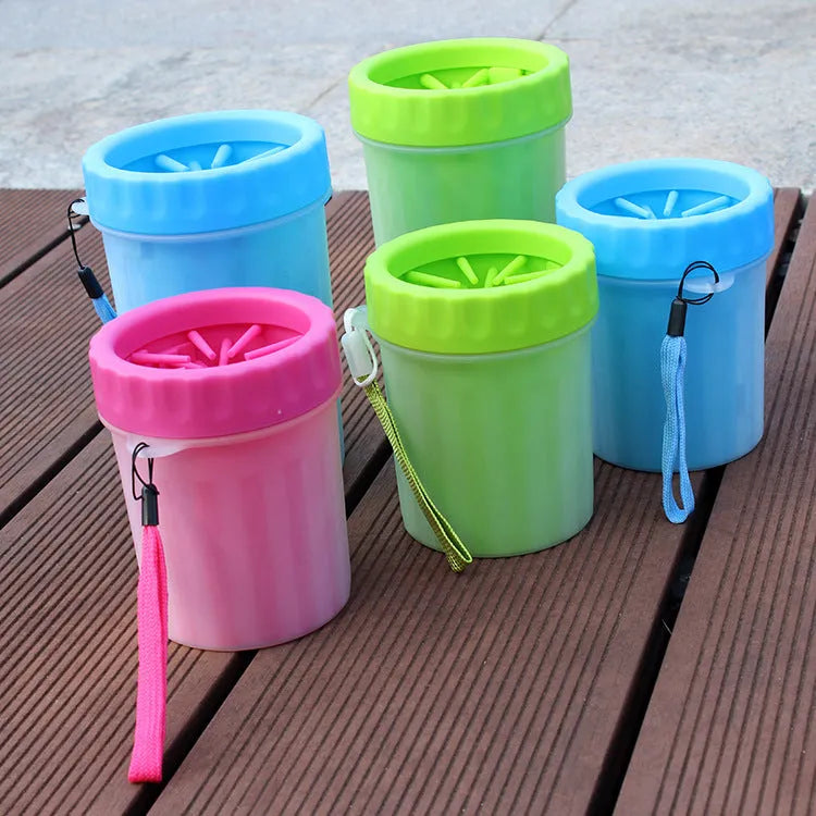 Blue silicone and PP portable dog foot wash barrel for cleaning pet paws.