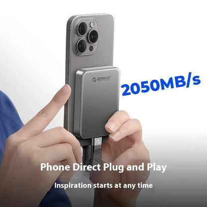 Grey magnetic mobile solid state drive with ultra-thin design and magnetic suction ring for phones and computers