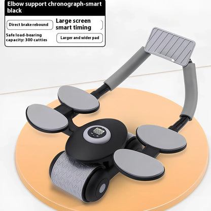 Black abdominal exercise wheel with four elbow support pads on grey floor