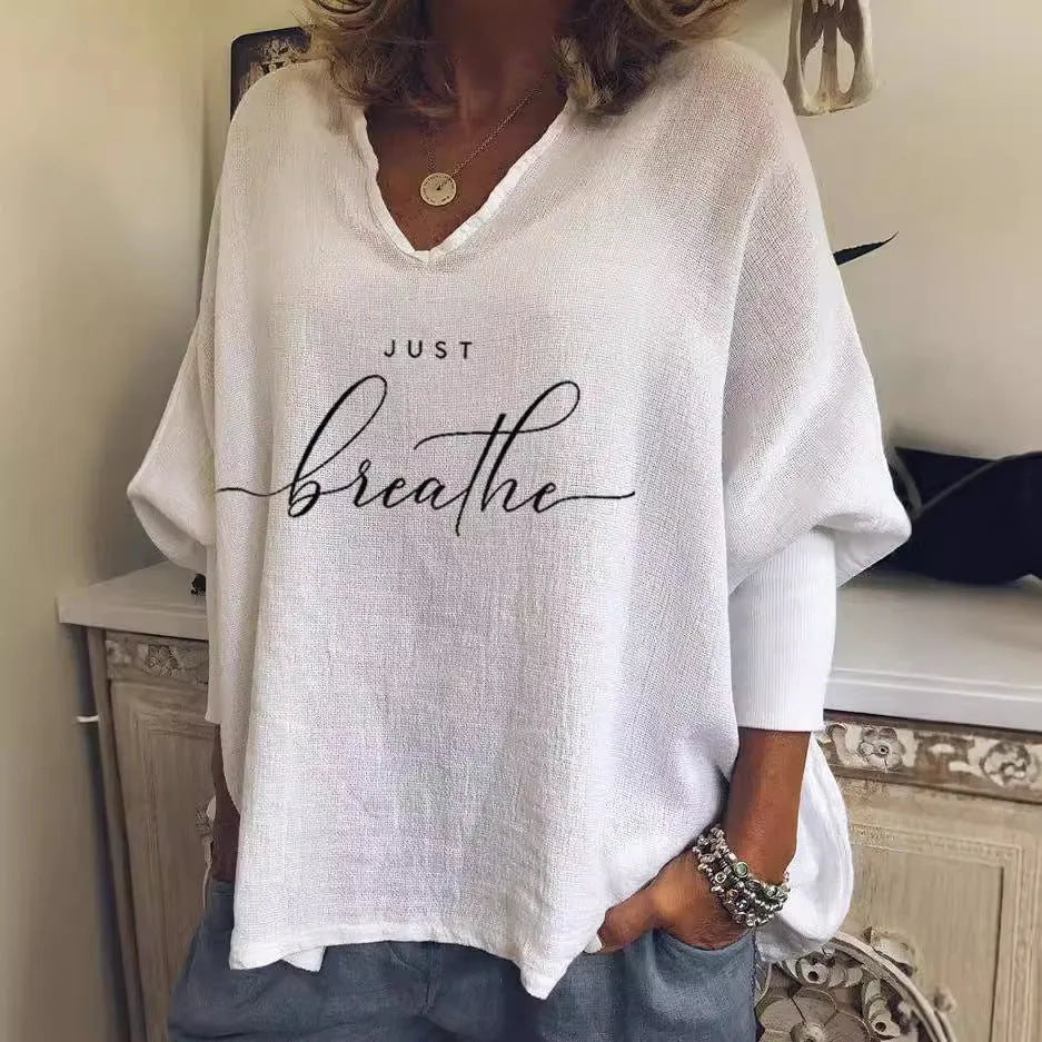 Women's loose-fit V-neck long sleeve top in brushed milk silk fabric for summer casual wear.