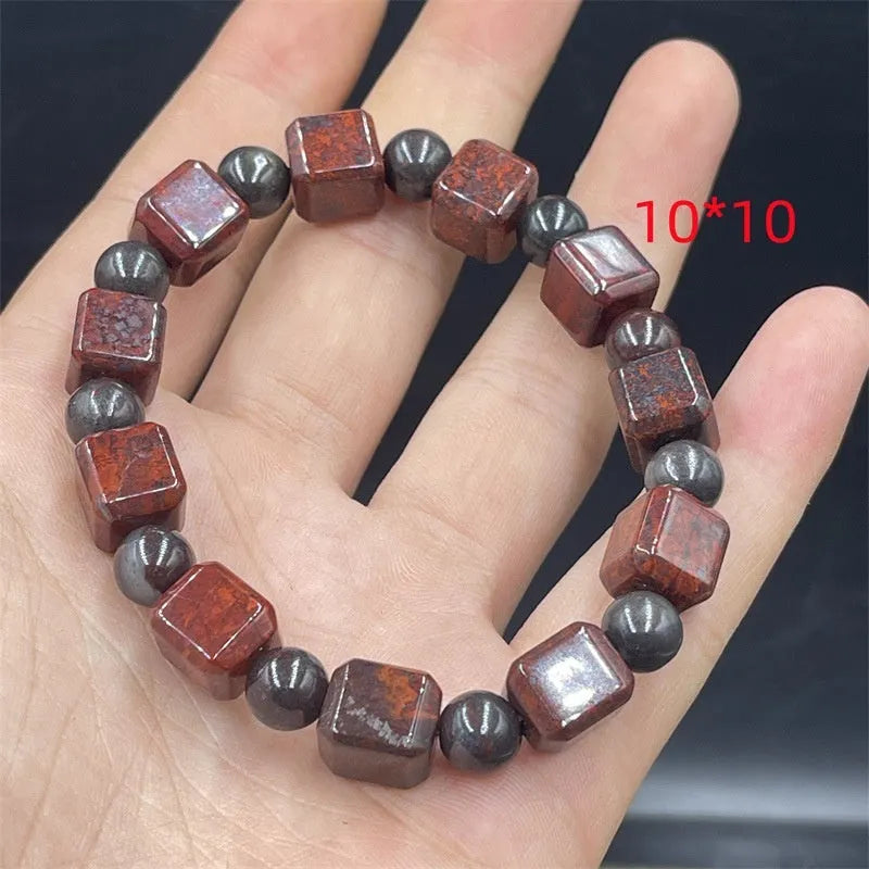 Bloodstone meteorite bracelet in quartz rock jade with traditional pendant options on wrist