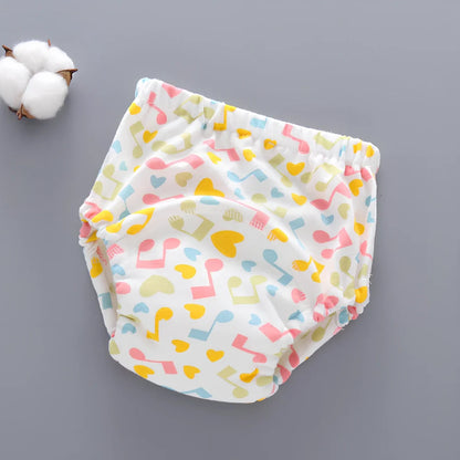 Washable baby training pants with 6-layer gauze construction in assorted patterns including animals and geometric designs