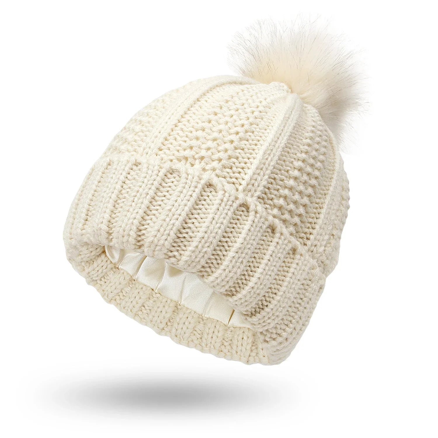 Cozy satin-lined knit beanie with plush faux fur pom-pom in various colors for women