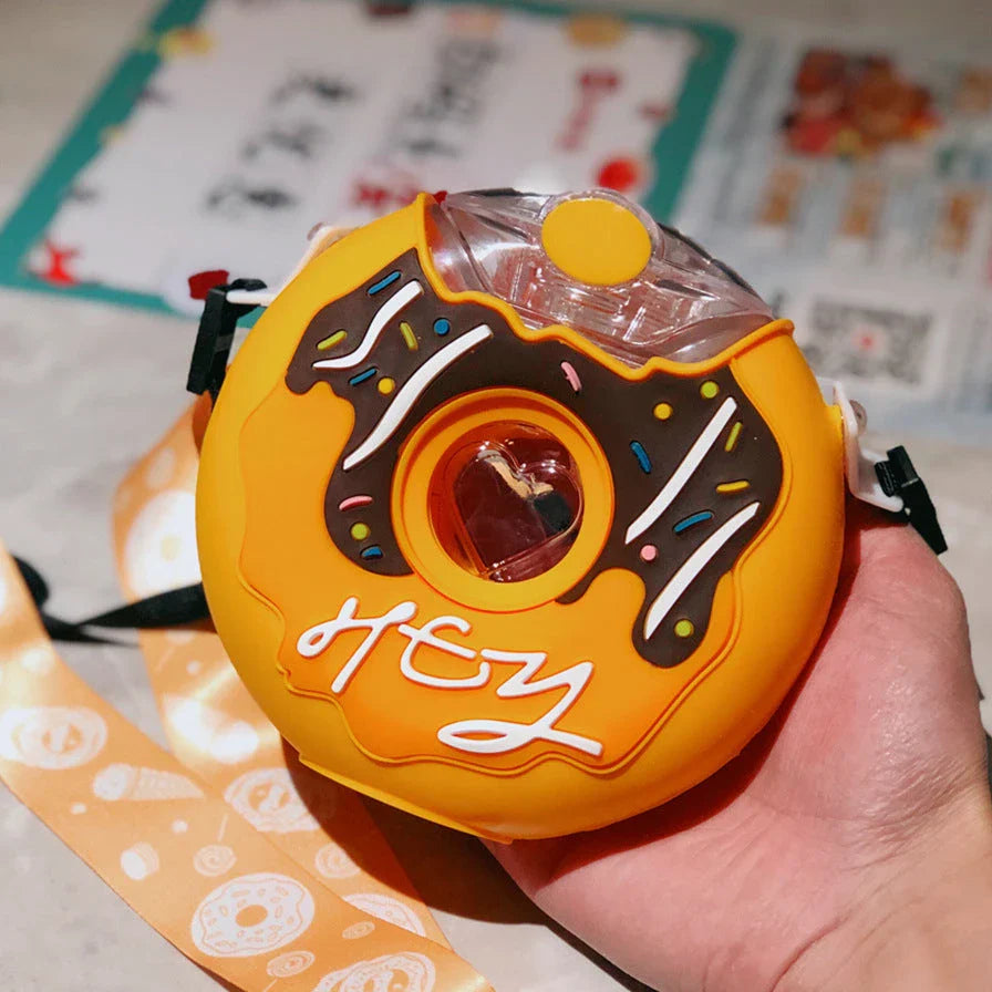 Donut-shaped water bottle with straw in various fun color options, perfect for on-the-go hydration