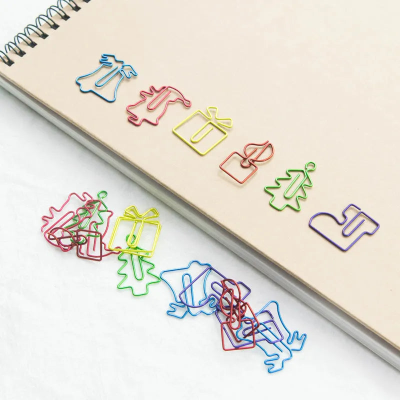 18 colourful Christmas-themed special-shaped metal paper clips in OPP bag packaging