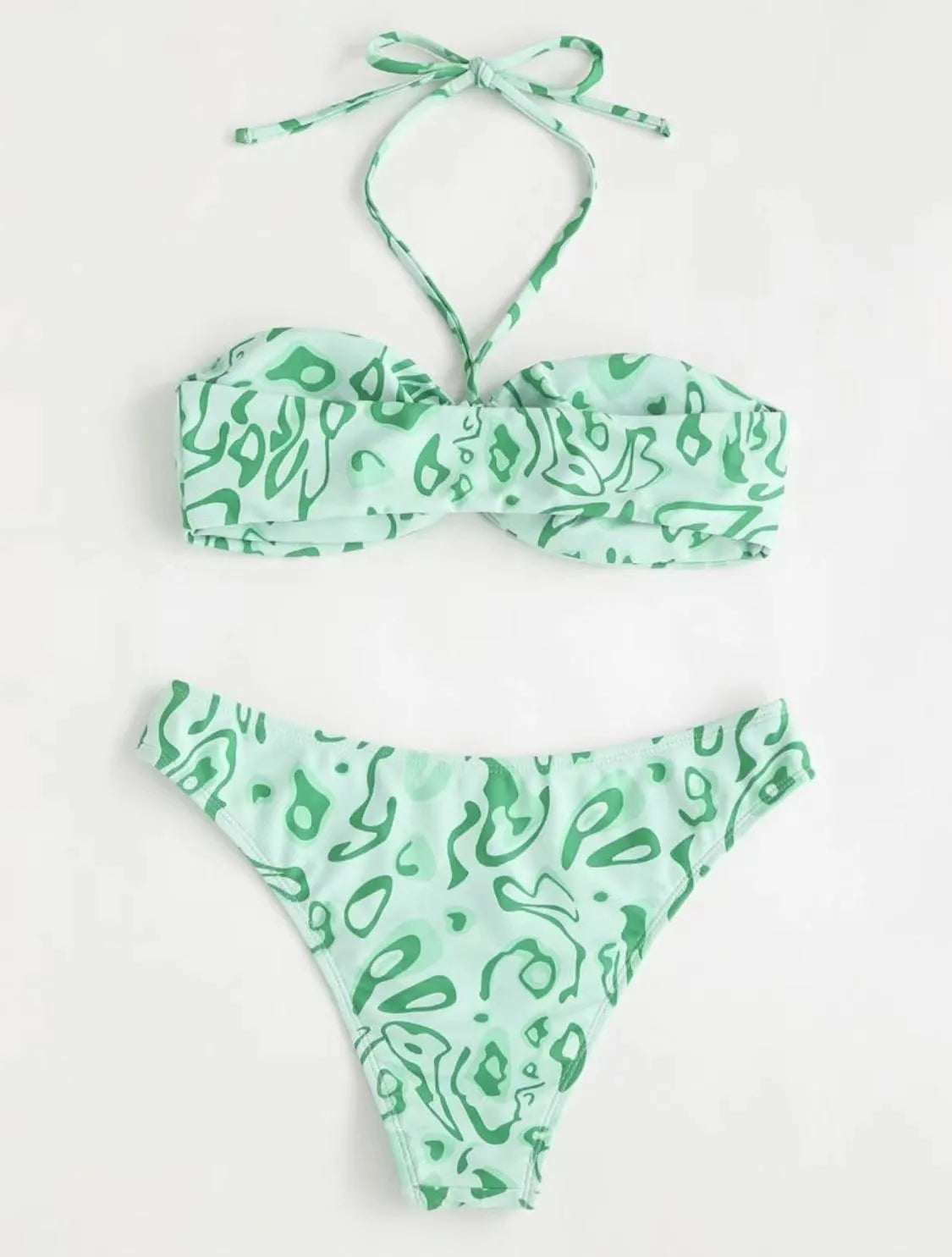 Blue floral pattern bandeau bikini swimsuit with backless design on mannequin