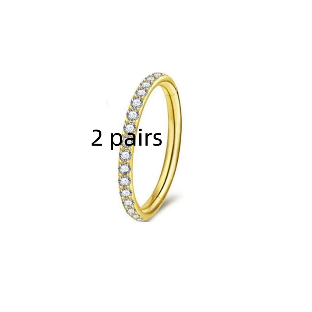 Stainless steel nose ring with diamond accent in seamless round design, showing size options and colour variations
