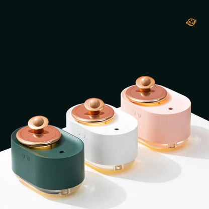 Rotating planet-shaped humidifier in green colour with USB cable and mist emitting from the top.